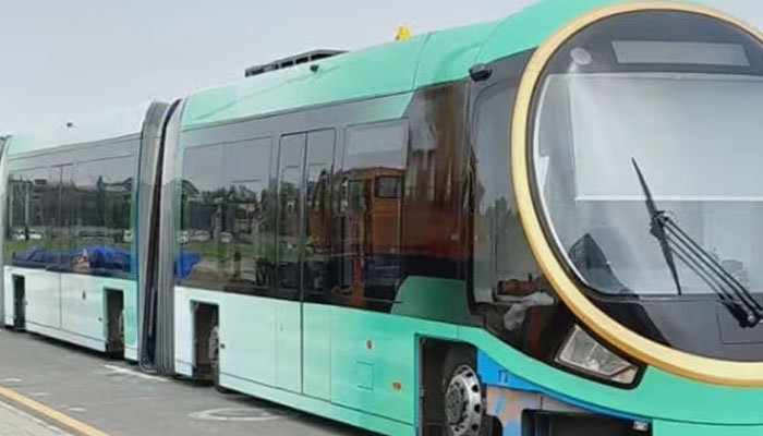 Modern electric tram on urban tracks, representing Pakistan's first electric tram launch in Lahore