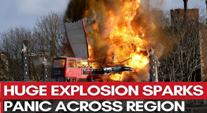 Thick smoke rising after a loud explosion with emergency response text overlay.