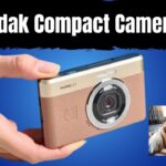 kodak compact camera PIXPRO C1 retro compact digital camera with brown and gold design held in hand